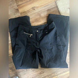 Nils ladies black ski pants 8 Regular very good condition. One small tear shown